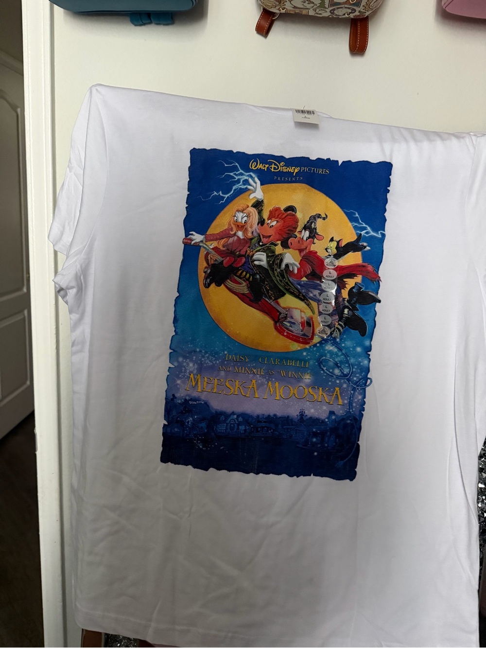 Disney White Graphic Tee featuring Meeska Mooska Artwork